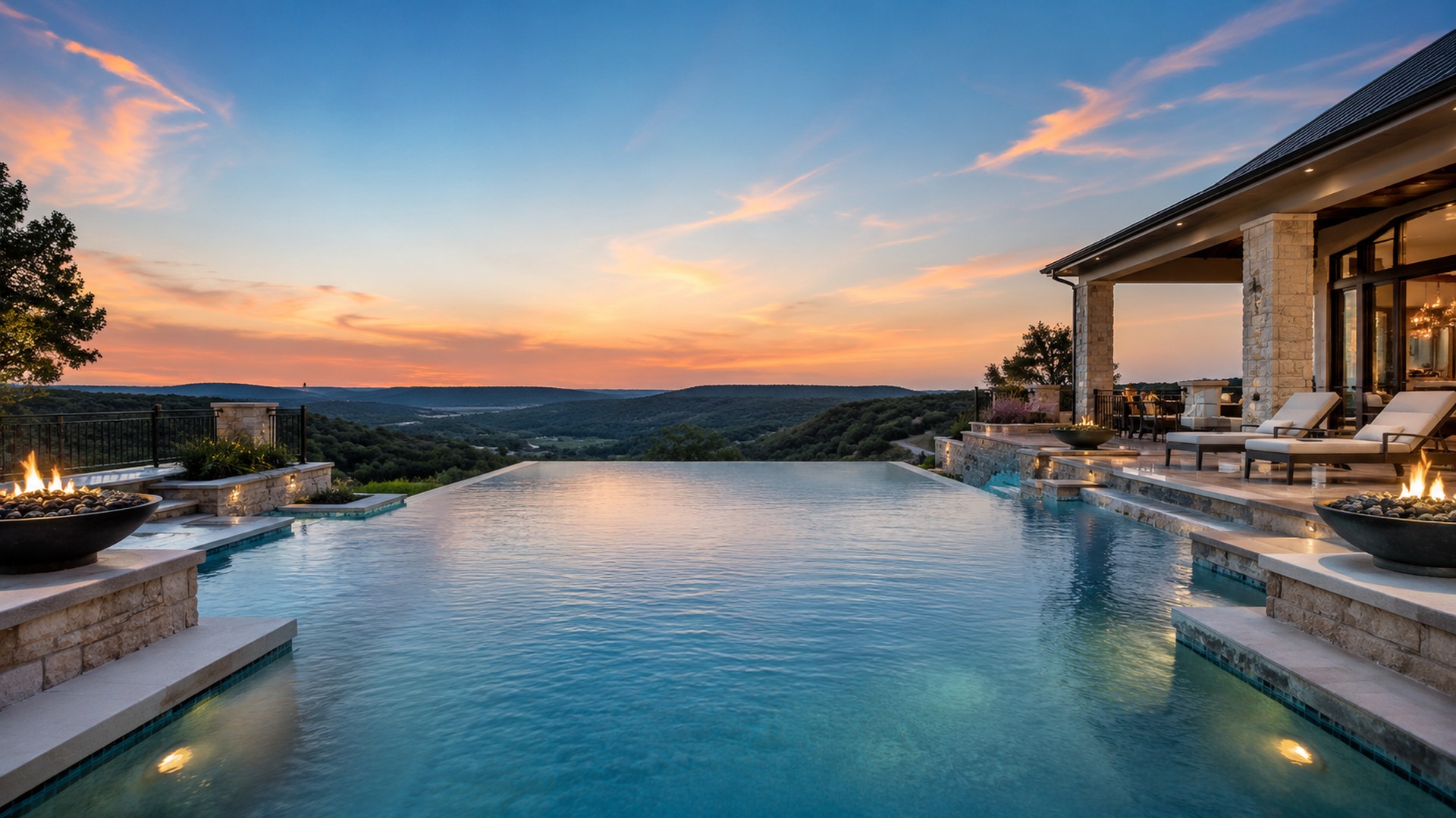 Luxury infinity-edge pool overlooking the Hill Country at sunset